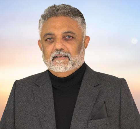 Man in a Blue Blazer with a Beard and Short Hair